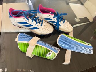 Girls soccer shoes and shin gaurds
