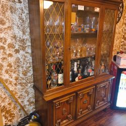 Wooden China With Two Doors And Shelves On The Bottom