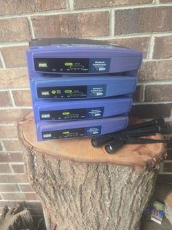 (4) Linksys WRT54 Routers