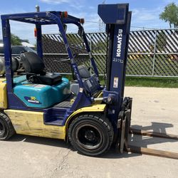 FOR SALE A PNUEMATIC KAMATSU FG30HT-12 FORKLIFT.6000LB CAPACITY,85/128 HIVIS MAST,SIDE-SHIFT,FRESH REBUILT ENGINE. IT IS IN GOOD WORKING CONDITION.