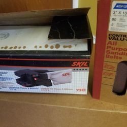 Sander with extra sandpaper