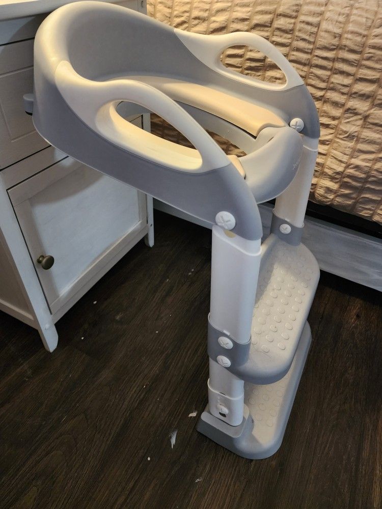 Jool Baby Toddler Potty Chair With Stairs Sits On Toilet