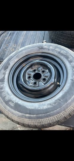 14 Inch 5-4 1/2 Ford Rim With Good Tire 