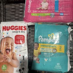 PAMPERS HUGGIES Diapers size ( 1 & 2 )