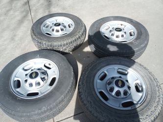 17 inch Chevy HD rims and tires 8 lug