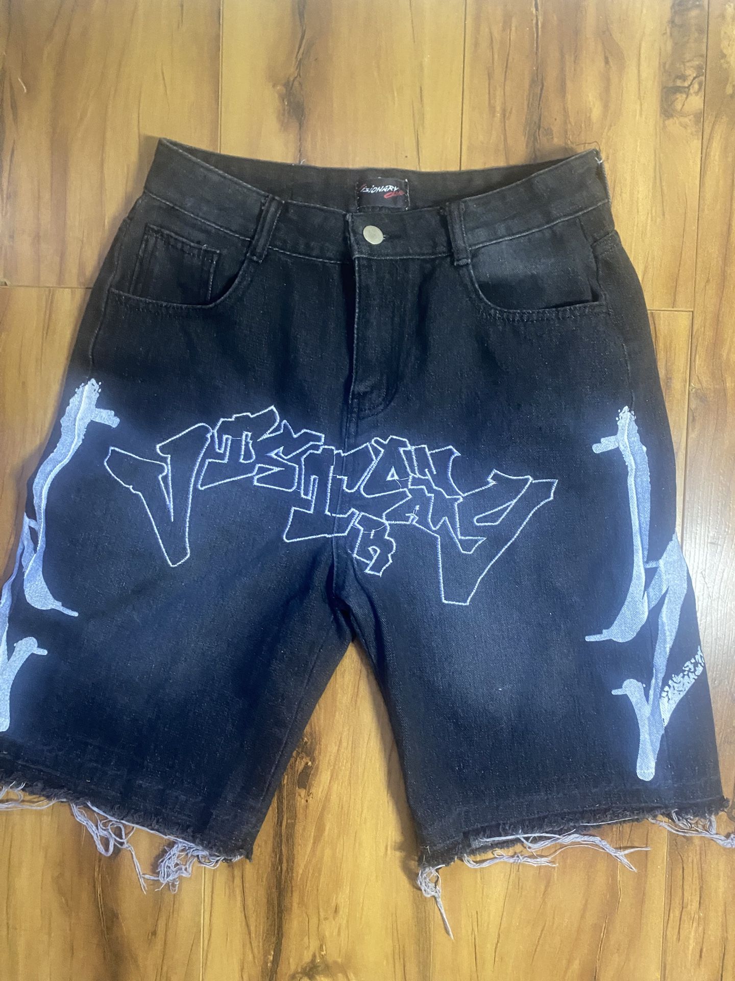 Black and White ripped denim shorts