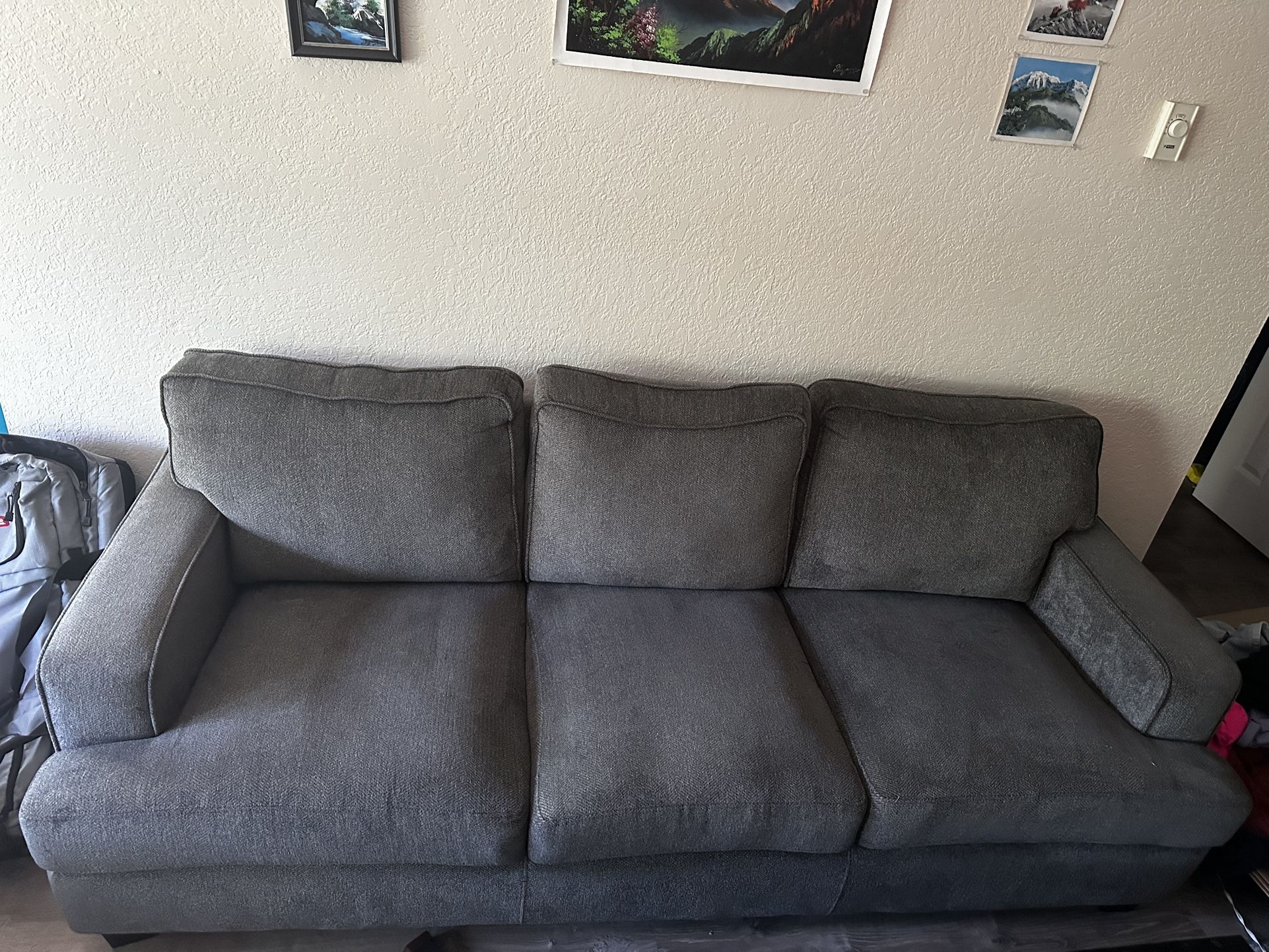 3-seater grey couch