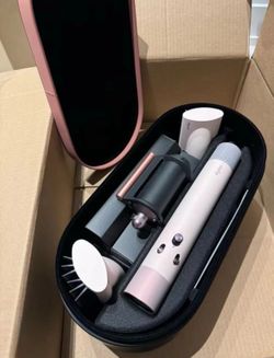 Dyson Airwrap Complete hair styling tool with attachments