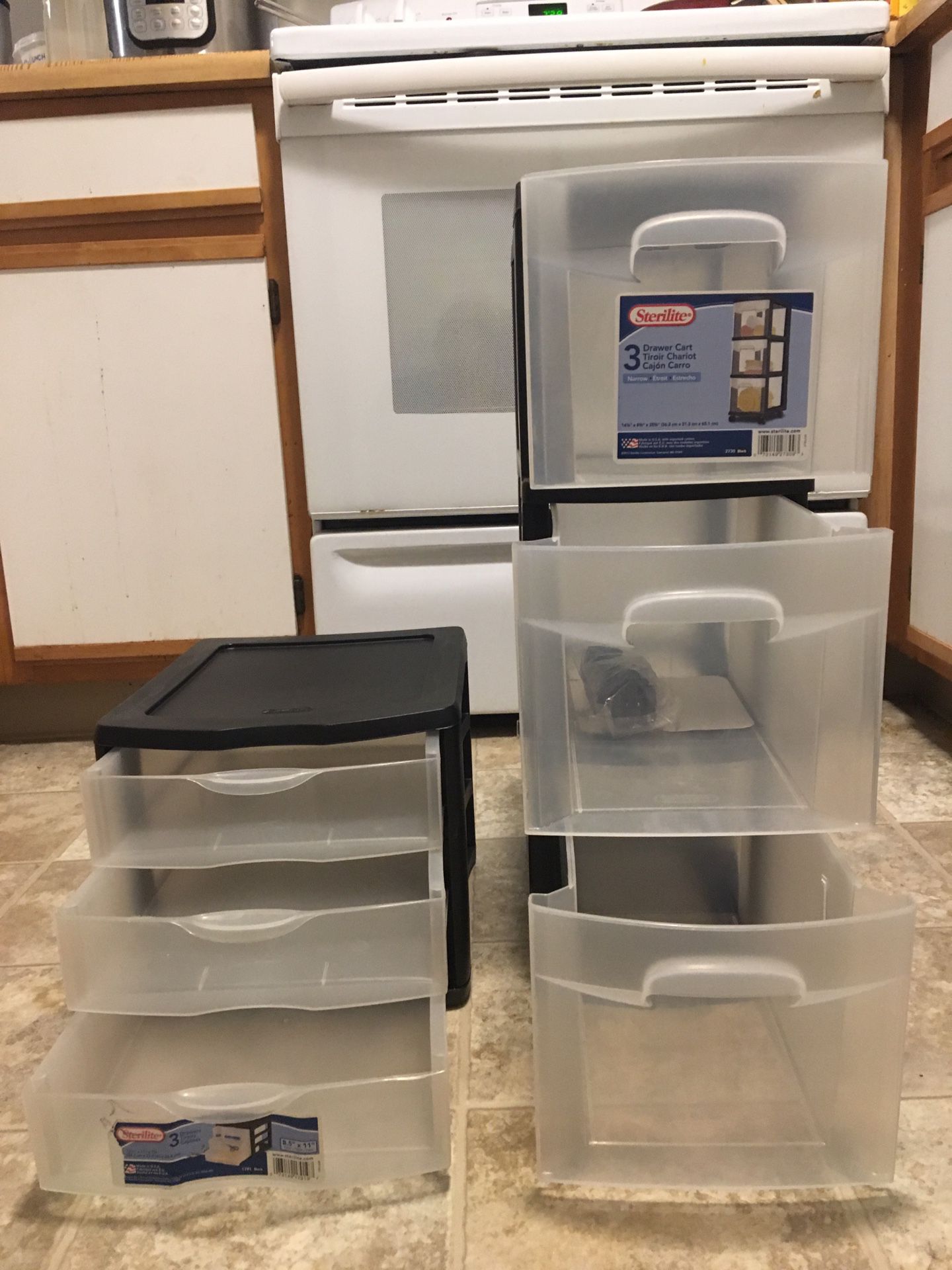 Two plastic drawer storage with three drawers