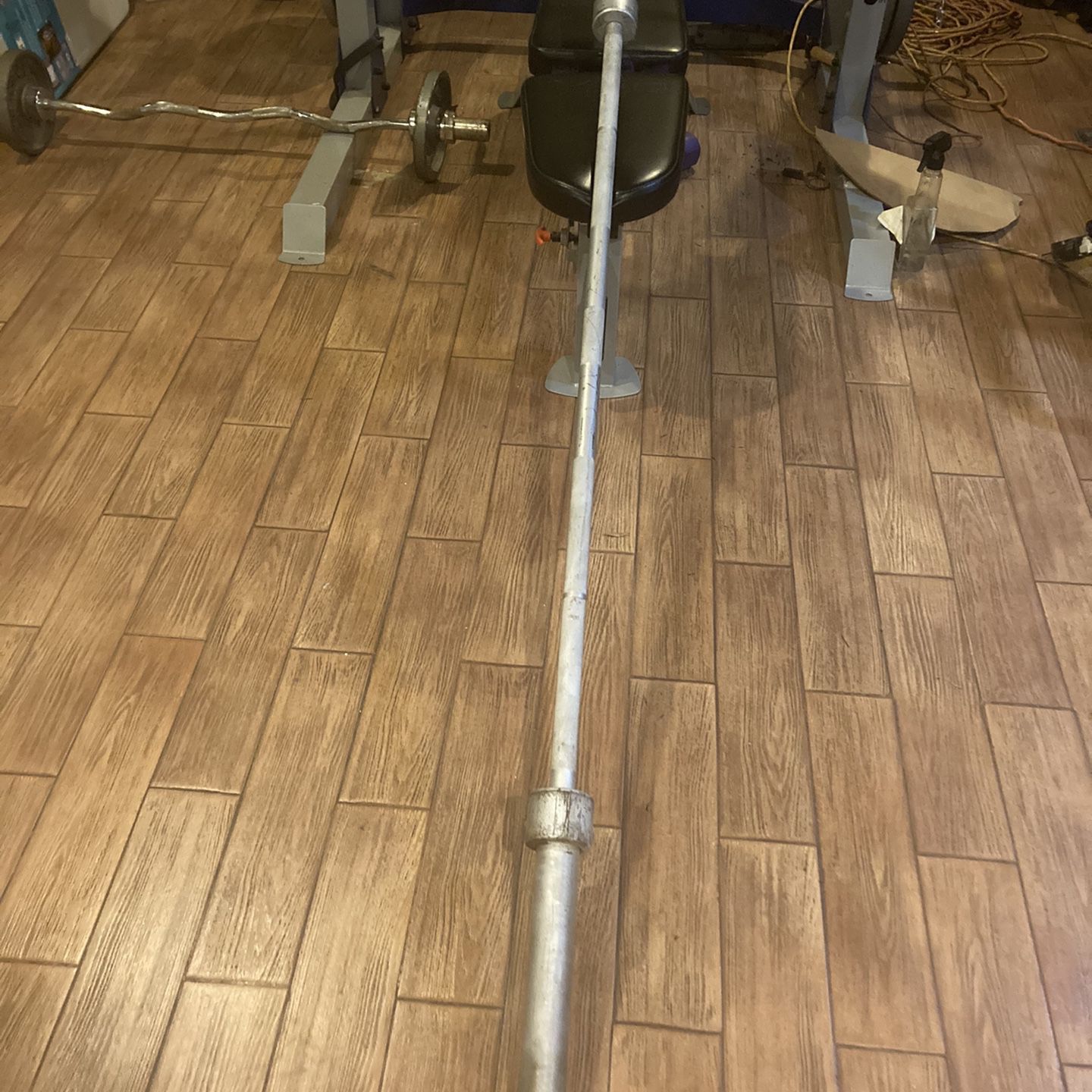 7 Ft. Bench Press Bar, No Weights Or Clamps Just Bar. I Am Willing To Trade For Two 35 Lb 2inch Plates. If Ad Is Up Still Avail