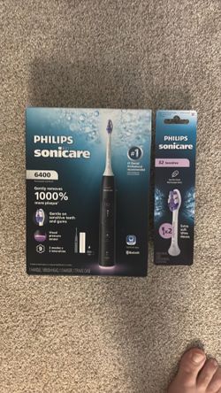 New Unused Philips Sonicare 6400 Toothbrush with Extra S2 Brush Heads