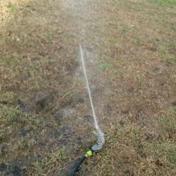 Heavy duty Above ground sprinkler system, like new. This sprinkler system  can cover a 50 ft diameter of yard. Its adjustable by angles, pressure, ele