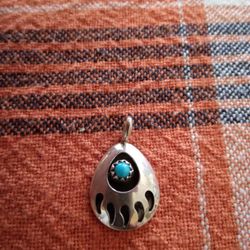 Silver Bear Claw With Small Turquoise Pendant.