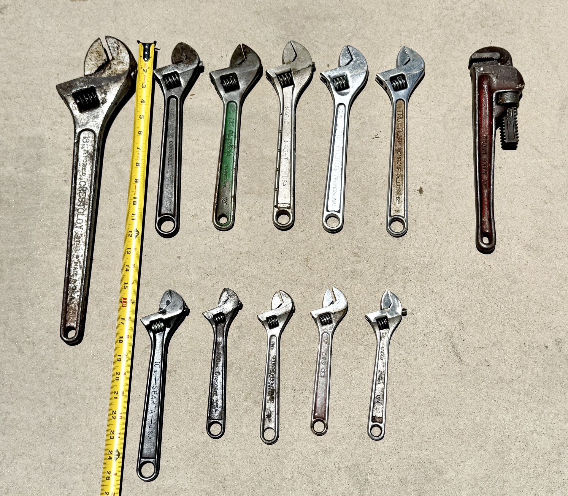 Assorted Crescent Wrenches and Pipe Wrench