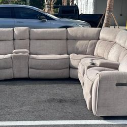 GRAY MODULAR SECTIONAL SOFA w 4 RECLINERS AND USB CHARGER by CITY FURNITURE - delivery is negotiable