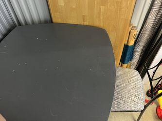Table And Three Chairs 