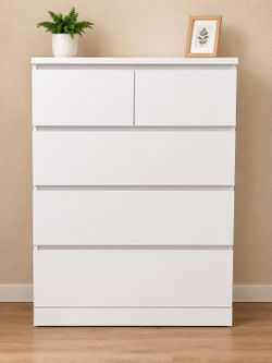 Selling an IKEA 6-drawer dresser in white.  * Excellent working condition * Clean and sturdy * All drawers slide smoothly Dimensions: * Width: 27.5 in