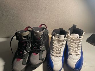 Two Pairs of Air Jordan High-Top Sneakers
