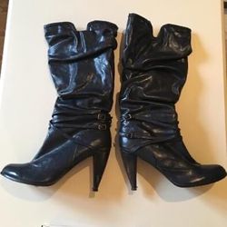 SIZE: 10. Blue leather heeled knee high boots