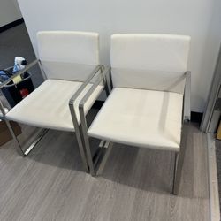 2 White Leather Chairs 