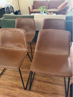 4 Brown faux leather dining chairs