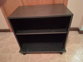 Two shelf unit with wheels