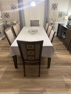 8 chair dining set with matching sideboard