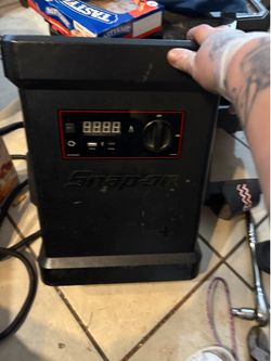 Snap-on battery jumper