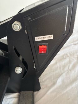 This is a TUSY 15x15 Inch Heat Press Machine, designed for transferring vinyl or sublimation ink onto items like t-shirts