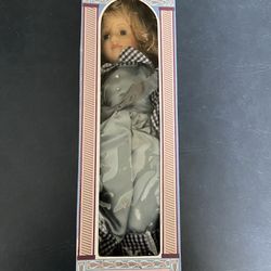 Kate- Porcelain Doll In The Original Box, Stand Included.