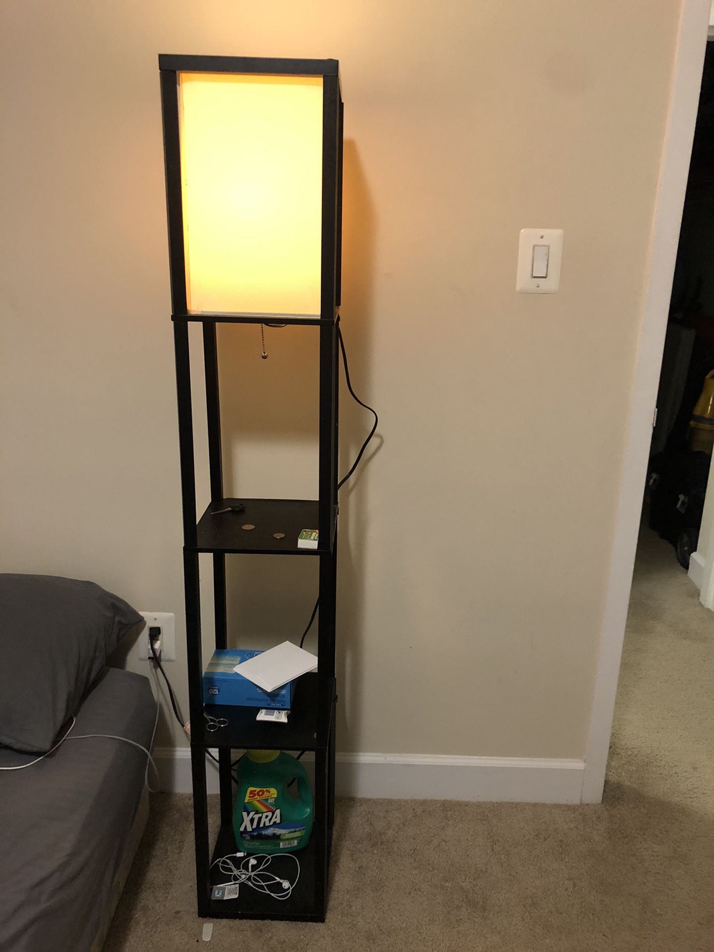 standing lamp and bookcase