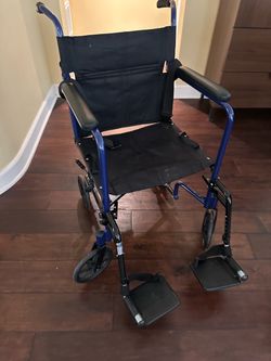 Folding Transport Wheelchair with Footrests