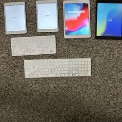 4 Apple iPads + 2 Apple Keyboards - - only $60