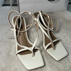 White heels with strips By Jemmi Doris
