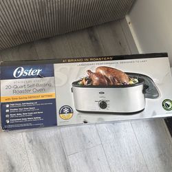 Oster 20 quart large self basting roaster oven with defrost capabilities
