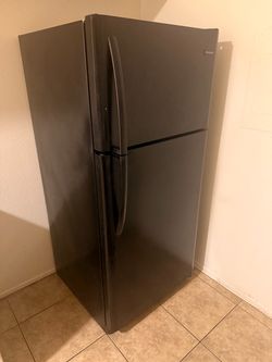 A black refrigerator
