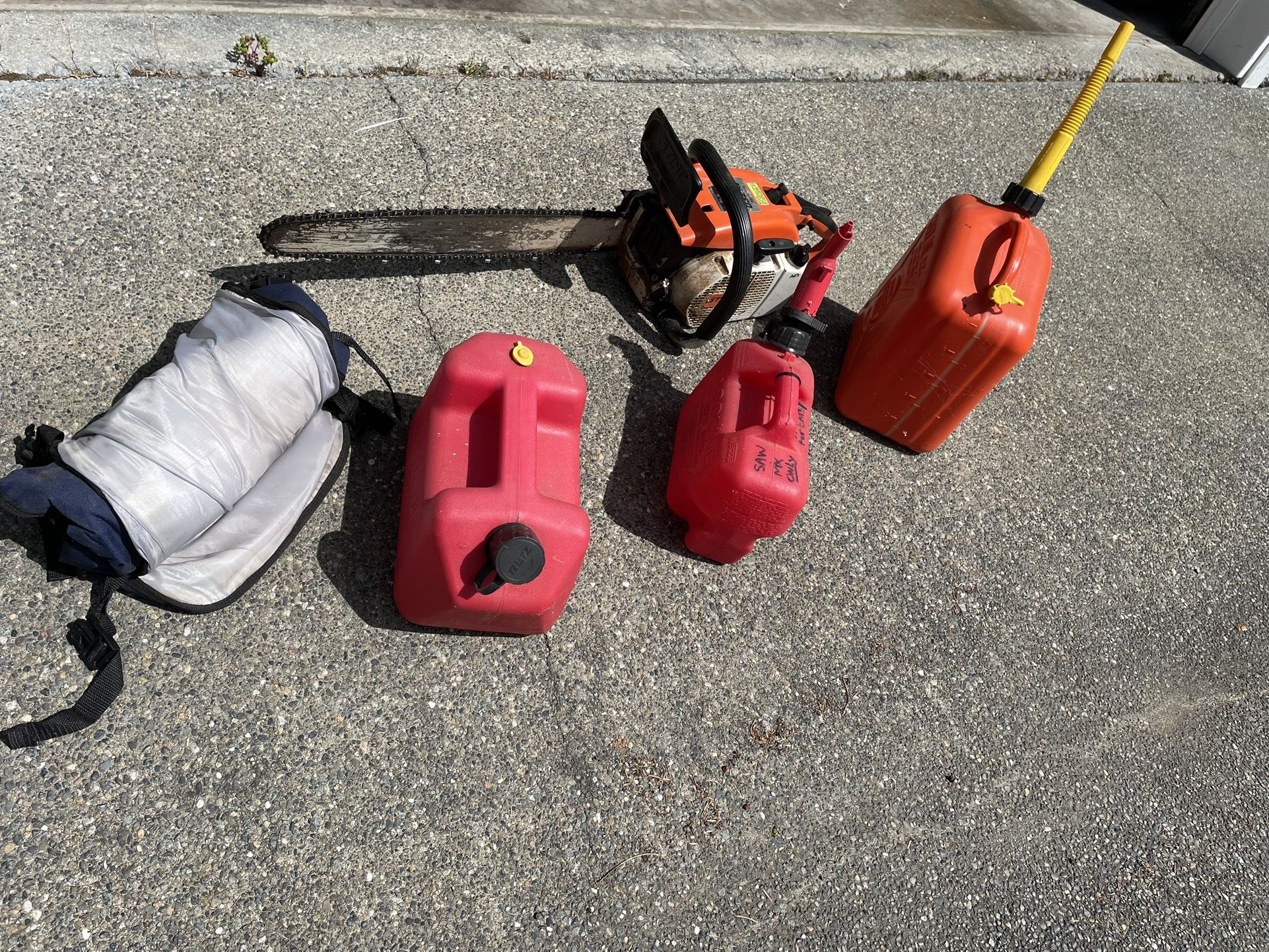 Stihl 032AV 20” Chainsaw, Chaps, Gas Cans, Oil Drain Pan