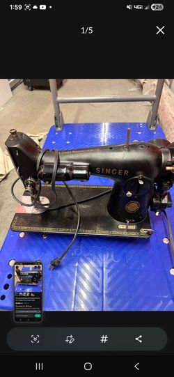 Vintage Sewing Machine (based on the serial number AM030113, this vintage Singer sewing machine was manufactured between 1955 and 1959