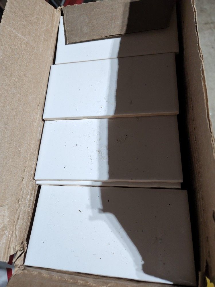 4 Boxes Of Tile. 120 For All