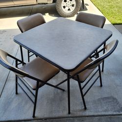 Folding table and chairs