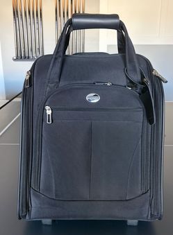 American Tourister rolling carry-on luggage bag.