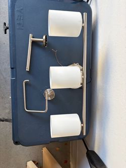 Bathroom light fixture and handles.