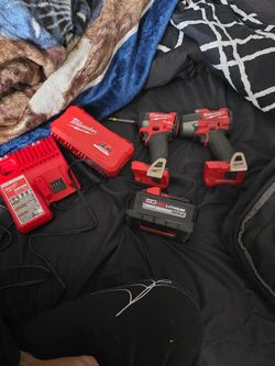 Milwaukee Impact Wrench 1/2 And Impact 1 M18 Battery And Charger