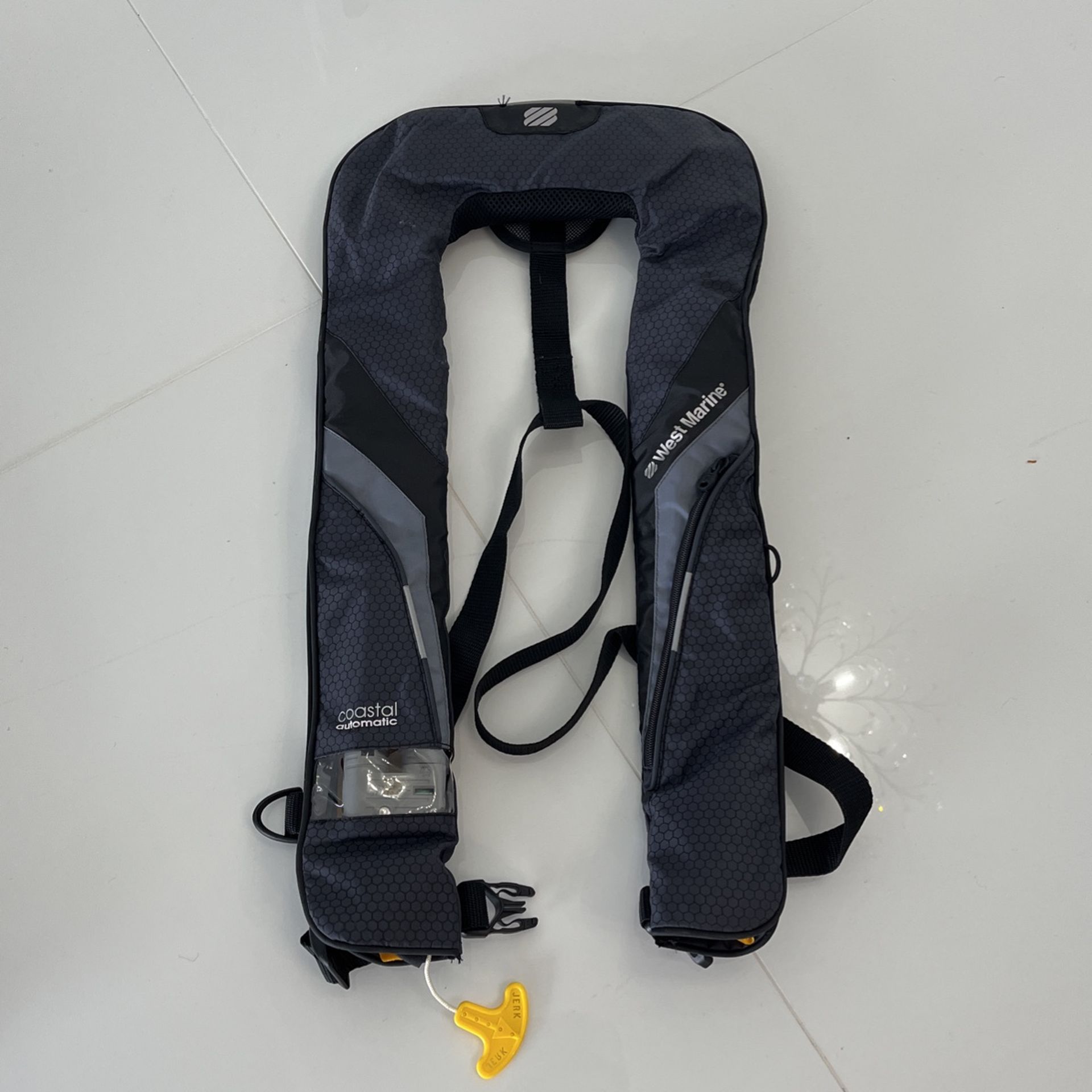 (6) West Marine Coastal Inflatable Life Jackets for Sale in Laud By Sea