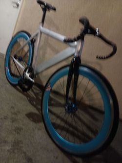 FOR SALE IS THIS FIXED GEAR BIKE