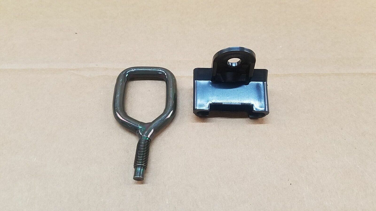 AFTERMARKET Q50 HOOD STRIKER PART