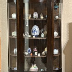 Antique mahogany curio cabinet