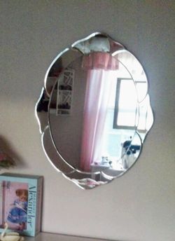 Beautiful, beveled, designer wall mirror.