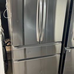 New Open Box Lg Four Door Stainless Steel Refrigerator With Internal Water/Ice 