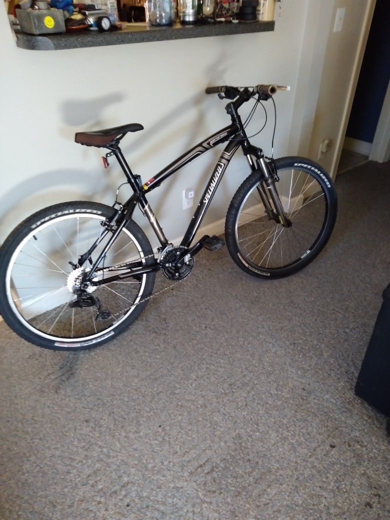 SPECIALIZED. HARD ROCK. MOUNTAIN BIKE. 21 SPEED. 26" WHEELS BLACK PEARL PAINT RETAIL 475. ASKING 240